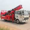 HOWO Truck Mounted Telescopic Ladder Truck for House Building Goods Lift and Download (House Furniture Moving Hydraulic 28 M Aerial Platform Ladder)