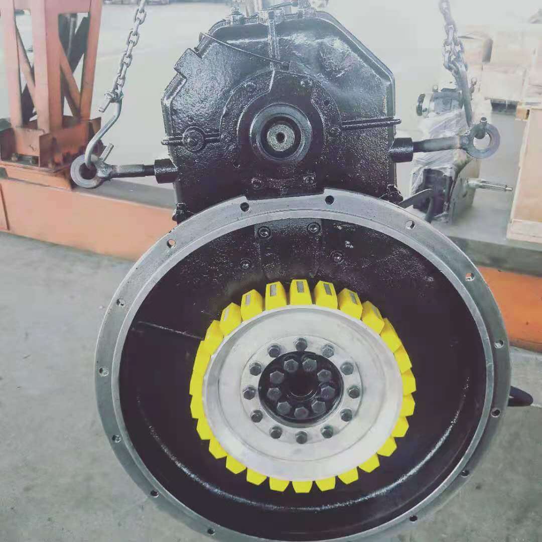Engine flywheel power transfer case