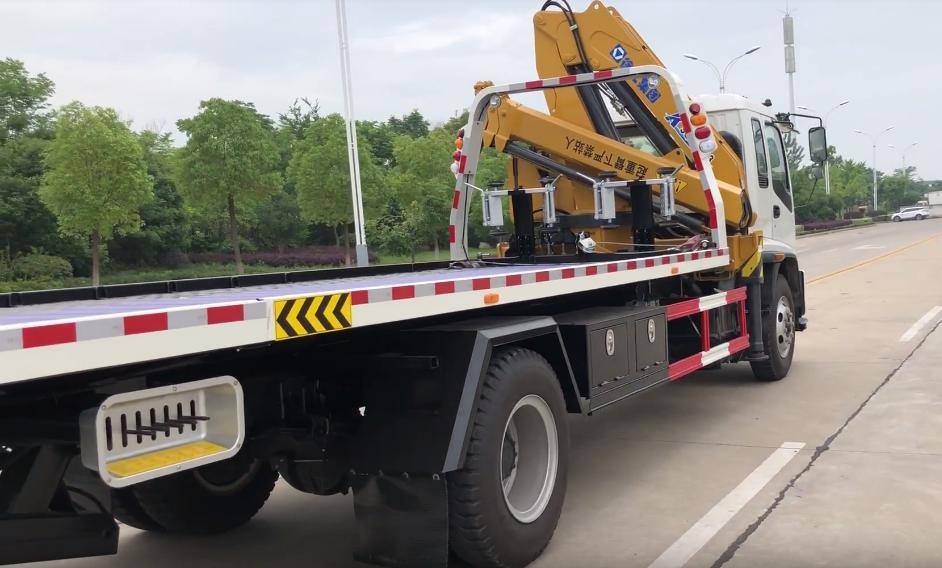 Japan. Brand I. S. U. Z. U Recovery Truck Mounted with Knuckle 5 Ton Crane and Roll Back Flatbed Wrecker Euro 5.6. Engine