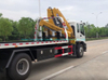Japan. Brand I. S. U. Z. U Recovery Truck Mounted with Knuckle 5 Ton Crane and Roll Back Flatbed Wrecker Euro 5.6. Engine
