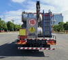 HOWO 10Ton ANFO Mixed Emulsion Explosive Truck with Loading Charging Telescopic Boom Crane